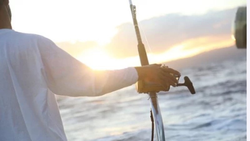 man fishing in Jaco