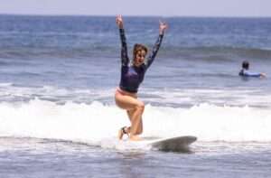 Woman surfing at Jaco Bach