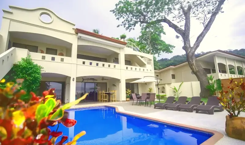 Luxury beachfront Royale Jade villa with tropical gardens and oceanfront views in Jacó, Costa Rica