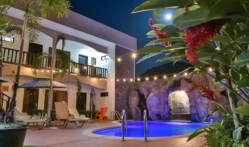 Modern Royale Lime luxury villa with private pool and tropical outdoor lounge area in Jacó, Costa Rica